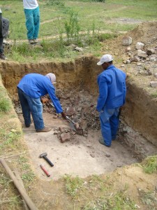 Finishing digging the pit for the long drop toilets at base.