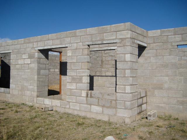 Enclosed front porch, looking into the front door to the sitting room.