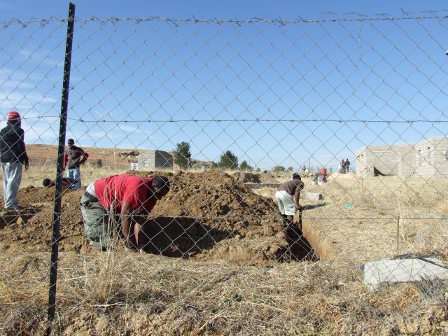 Digging the foundation for dorms at the LXP Lesotho Base.