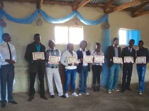 The graduates with their certificates