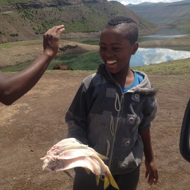 Buying fish freshly caught in the river
